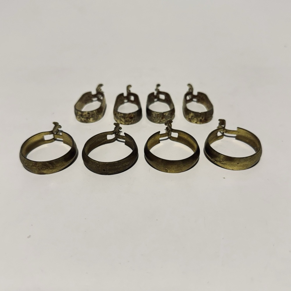 (8) Two Sets of 4 Vintage Oval and Circular Gold Toned Curtain Clips
